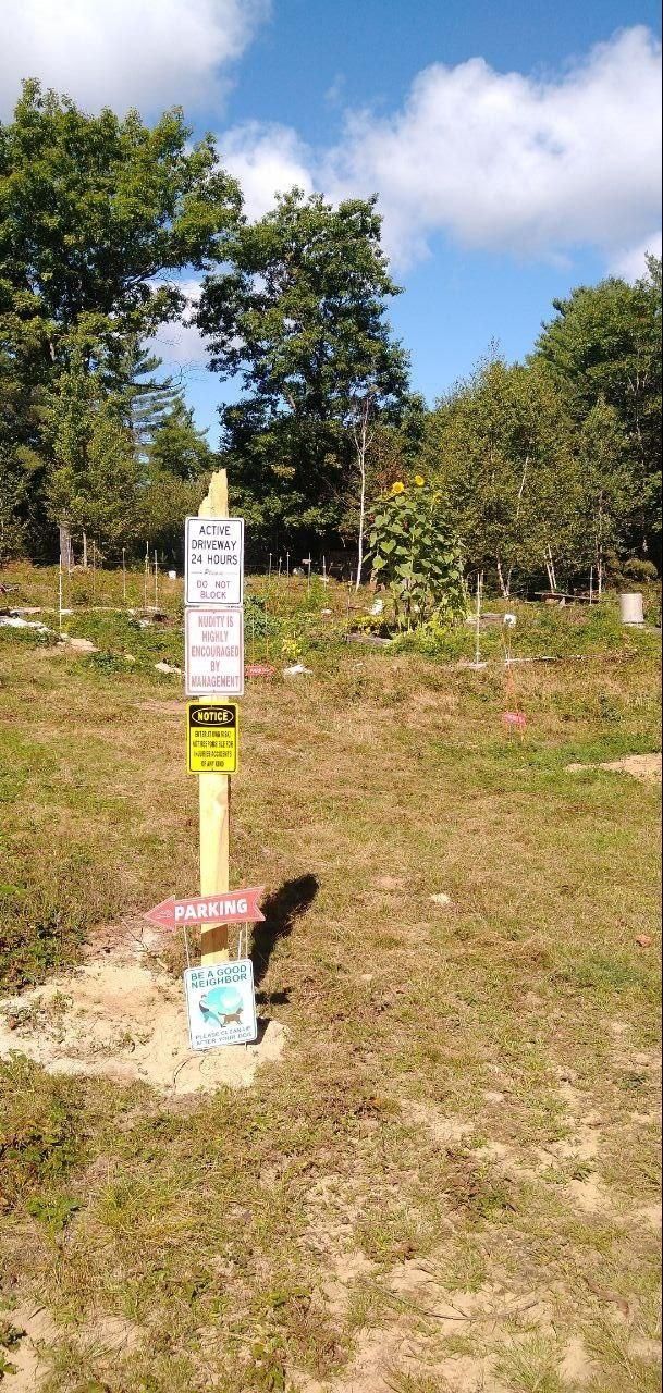 camp marker sign post in summer at Bartertowne, Canaan New Hampshire
